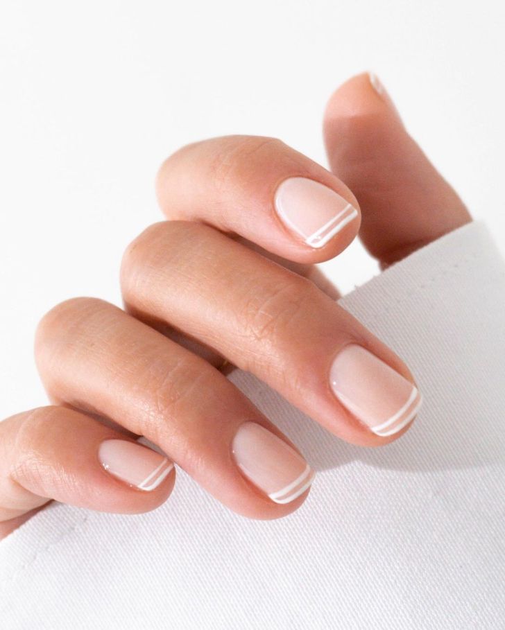 Ongles mariage double French pour touche contemporaine
